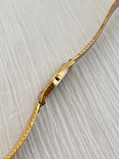 Detail of the aftermarket mesh bracelet on the Omega De Ville watch.