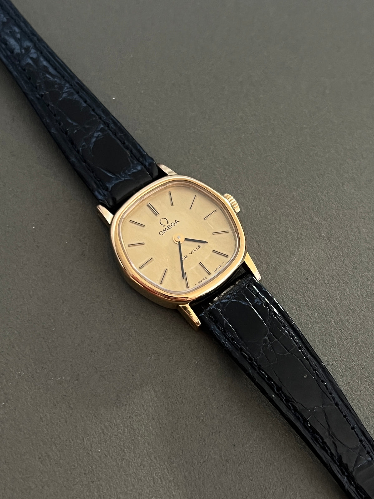 Omega De Ville Cushion Case Woman's Watch, wrist shot of a vintage women's watch at Gilded Hour.