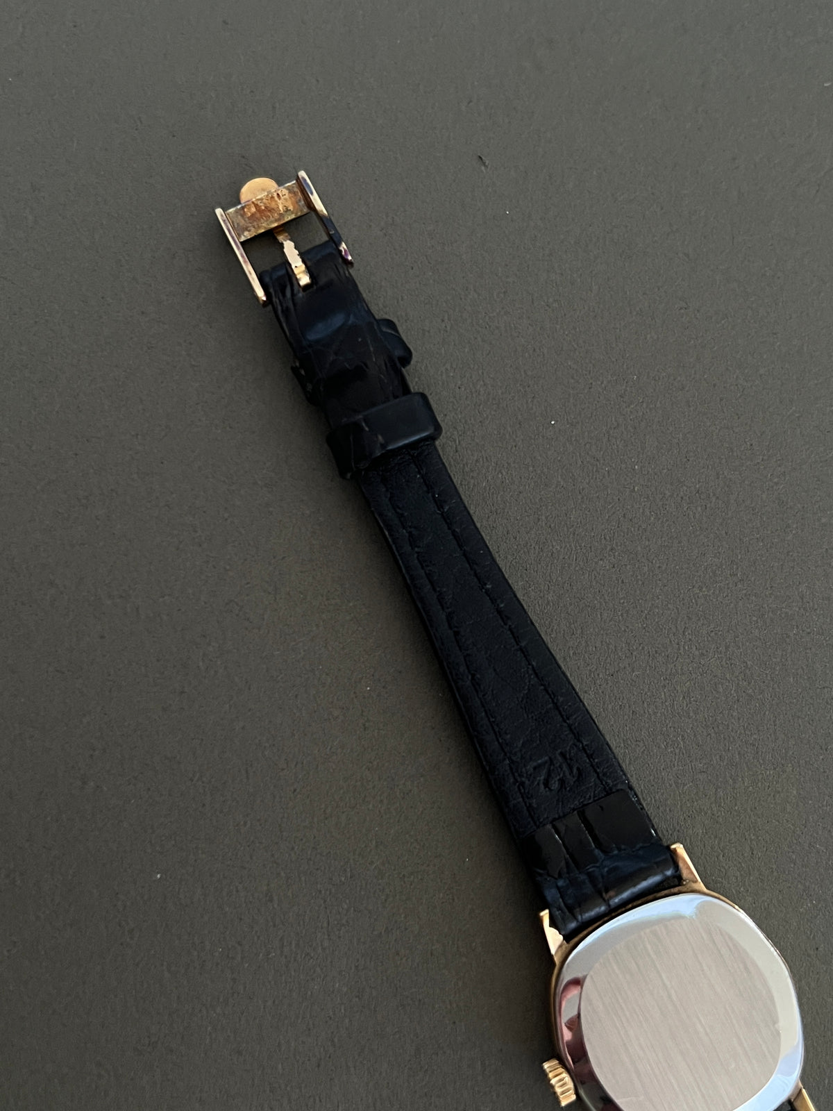 Omega De Ville Cushion Case Woman's Watch, wrist shot of a vintage women's watch at Gilded Hour.