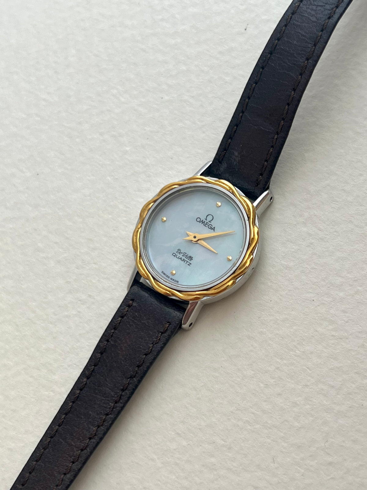 Caseback detail of the vintage Omega De Ville gold-tone ladies watch.