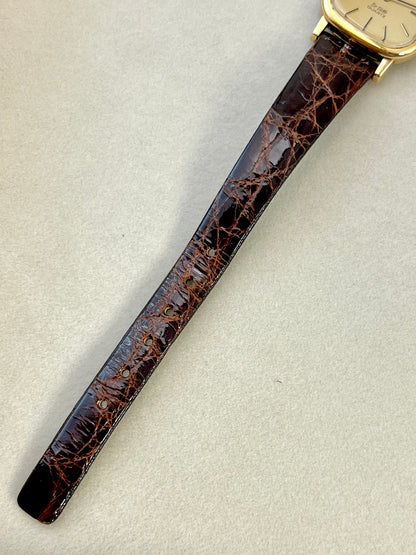 Detail of the Omega De Ville black leather strap.