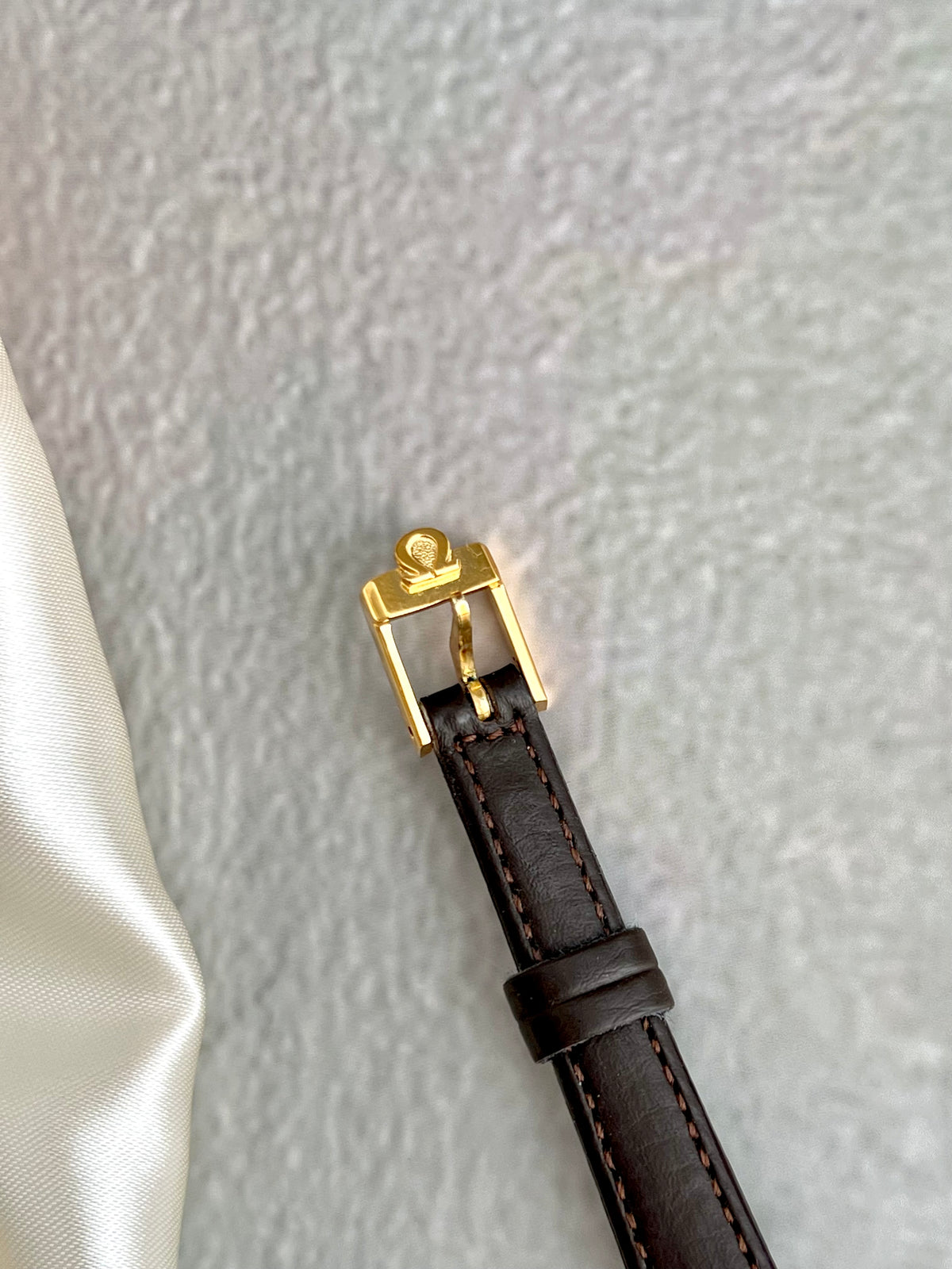 Caseback detail of the Omega De Ville women's watch.