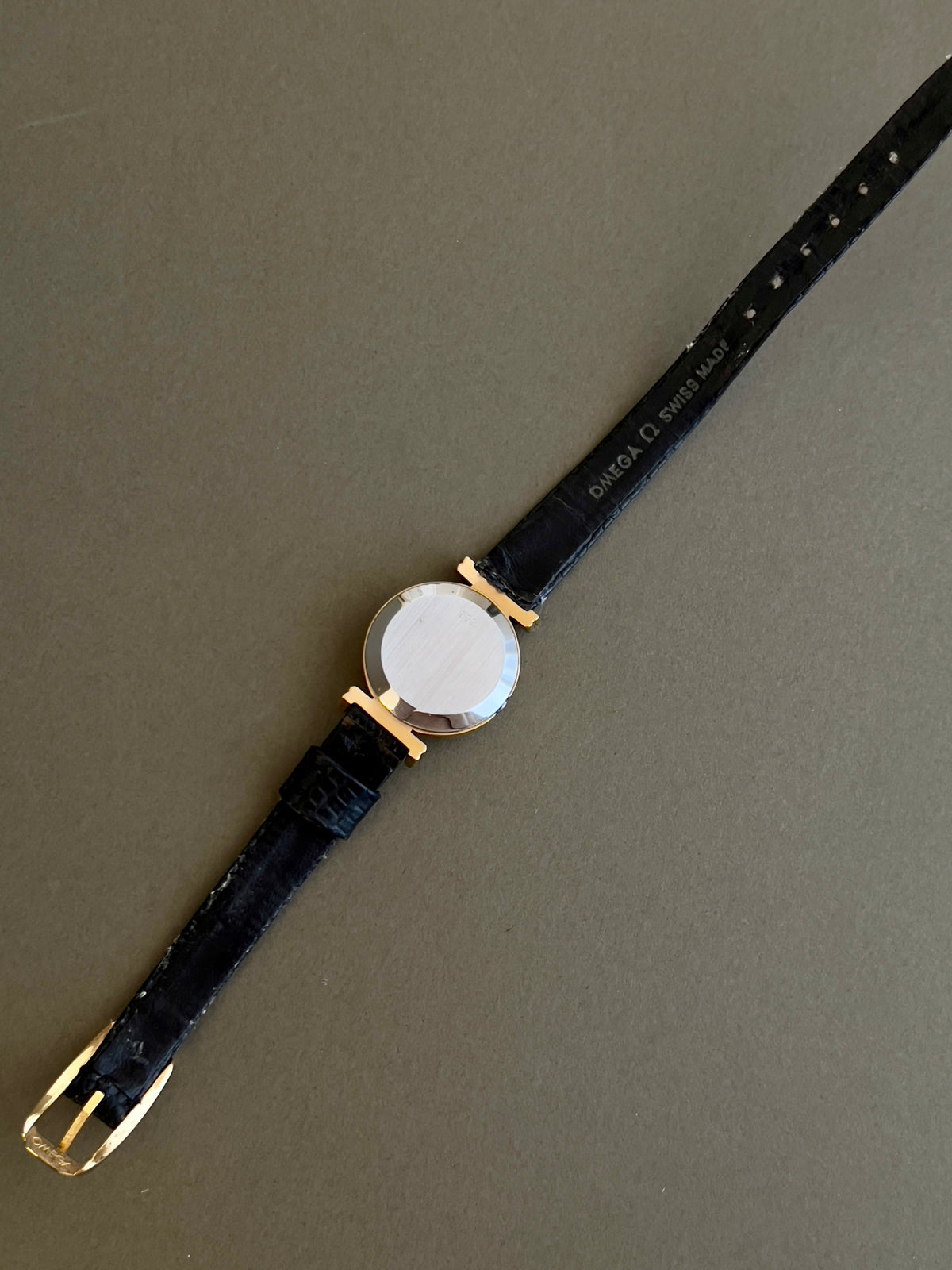 Omega De Ville Gold Toned Round Women’s Watch, case profile of a vintage women's watch at Gilded Hour.