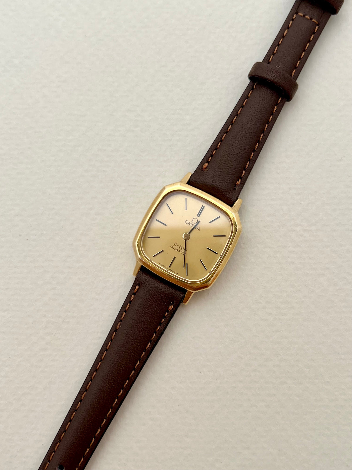 Omega De Ville Gold Toned Soft Octo Women’s Watch, wrist shot of a vintage women's watch at Gilded Hour.
