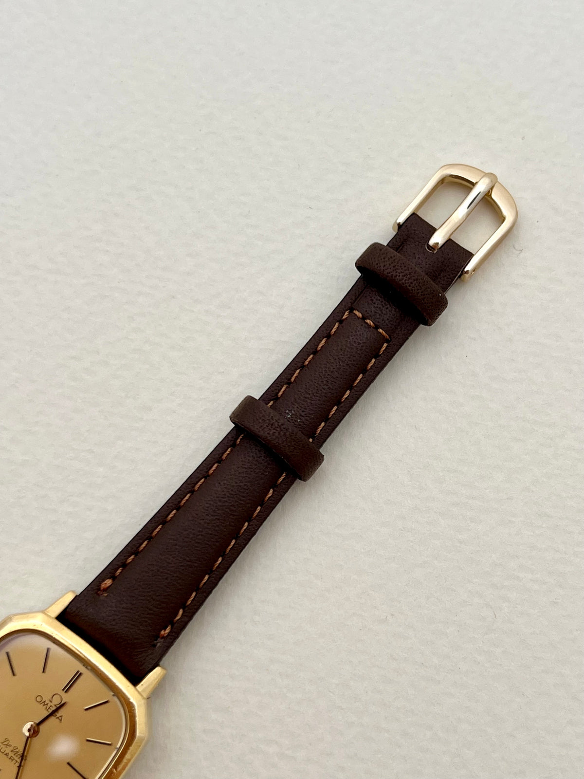 Omega De Ville Gold Toned Soft Octo Women’s Watch, case profile of a vintage women's watch at Gilded Hour.