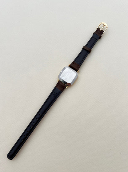 Omega De Ville Gold Toned Soft Octo Women’s Watch, caseback detail of a vintage women's watch at Gilded Hour.