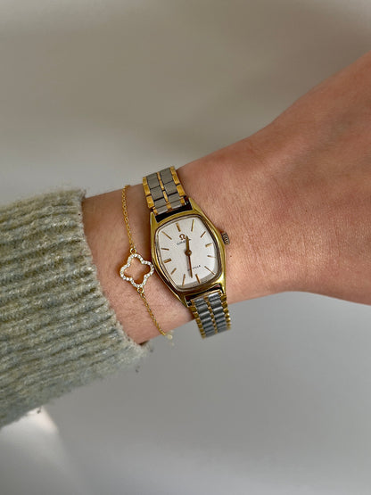 Omega De Ville Gold Woman's Watch with Tonneau Case, dial close up of a vintage women's watch at Gilded Hour.