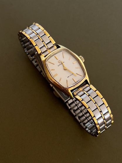 Omega De Ville Gold Woman's Watch with Tonneau Case, wrist shot of a vintage women's watch at Gilded Hour.