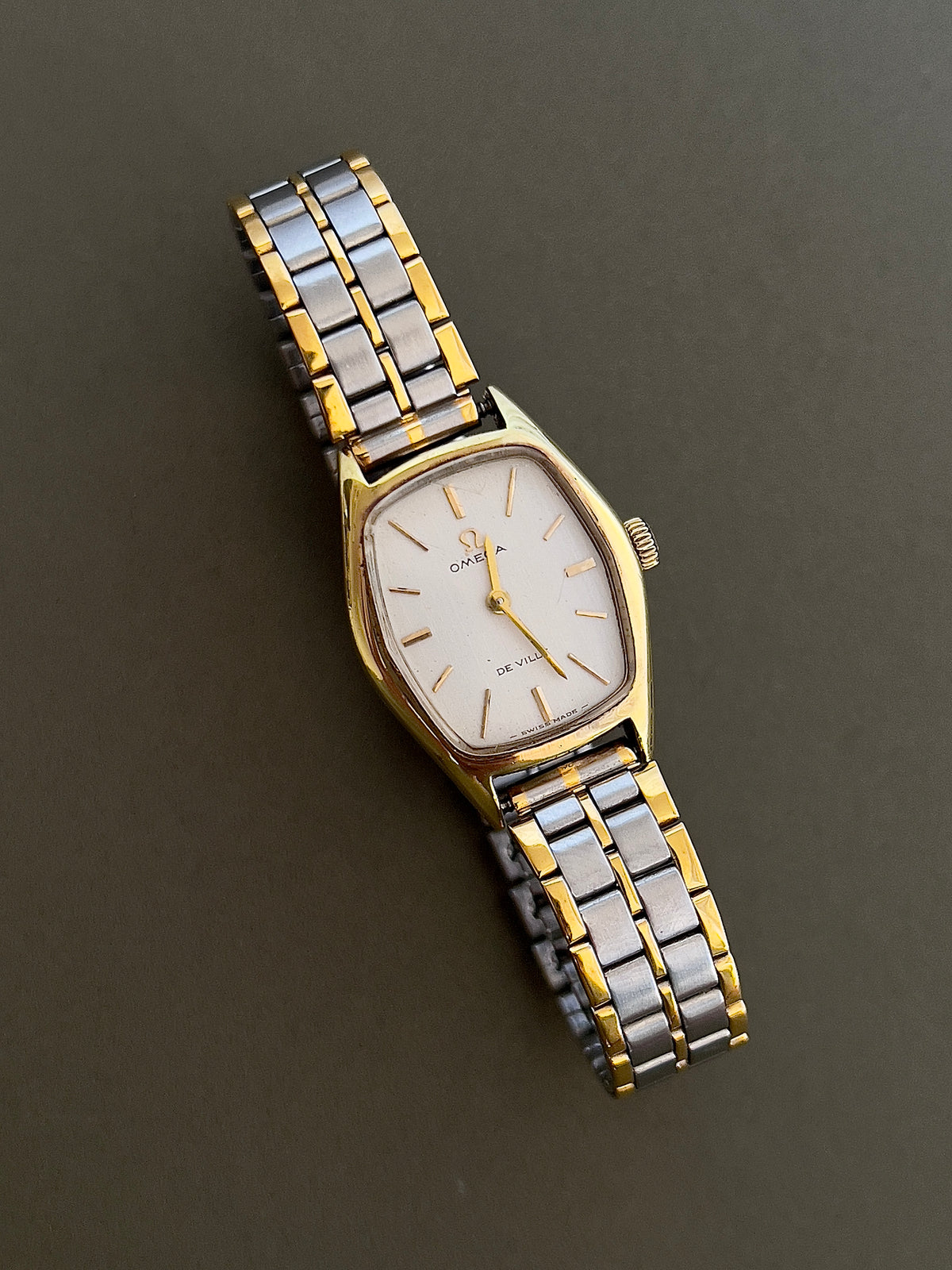 Omega De Ville Gold Woman's Watch with Tonneau Case, case profile of a vintage women's watch at Gilded Hour.