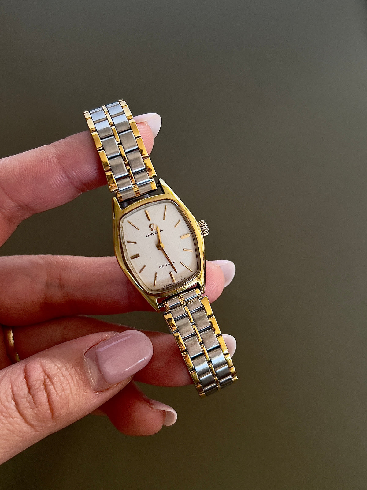 Omega De Ville Gold Woman's Watch with Tonneau Case, caseback detail of a vintage women's watch at Gilded Hour.