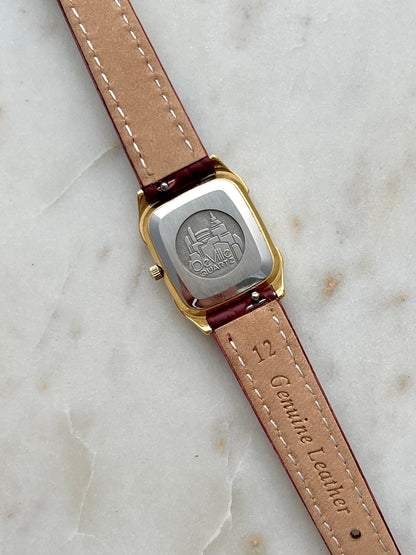 Omega De Ville Burgundy Roman Dial Strap Watch: case back and strap lining.