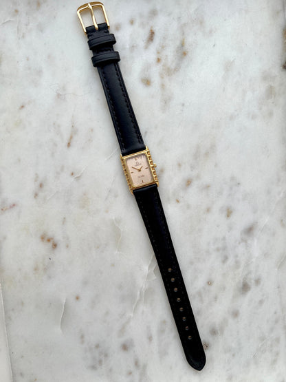 Omega De Ville Striped Champagne Dial Gold Watch: full watch laid flat.