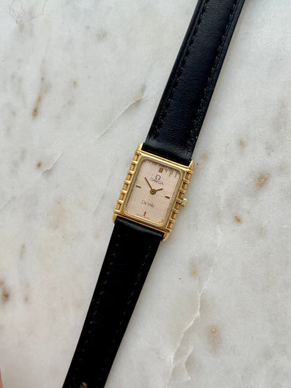 Omega De Ville Striped Champagne Dial Gold Watch: opposite angle of rectangular case.