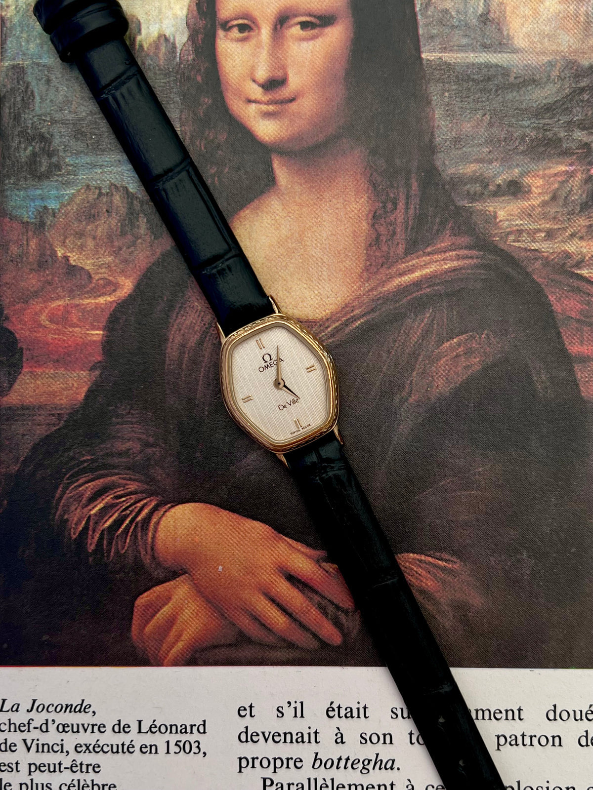 Omega De Ville gold tonneau ladies watch, dial close-up.