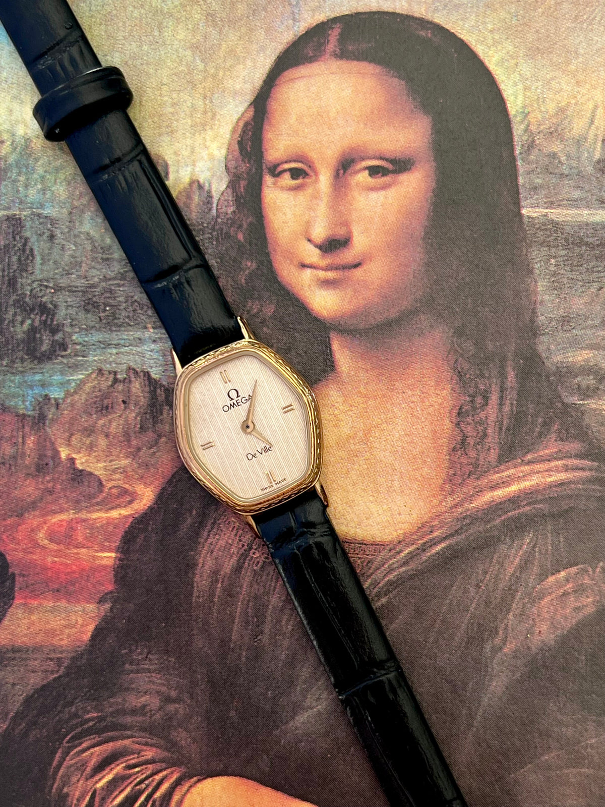 Omega De Ville gold tonneau ladies watch, case profile.