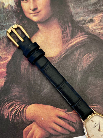 Omega De Ville gold tonneau ladies watch, strap detail.