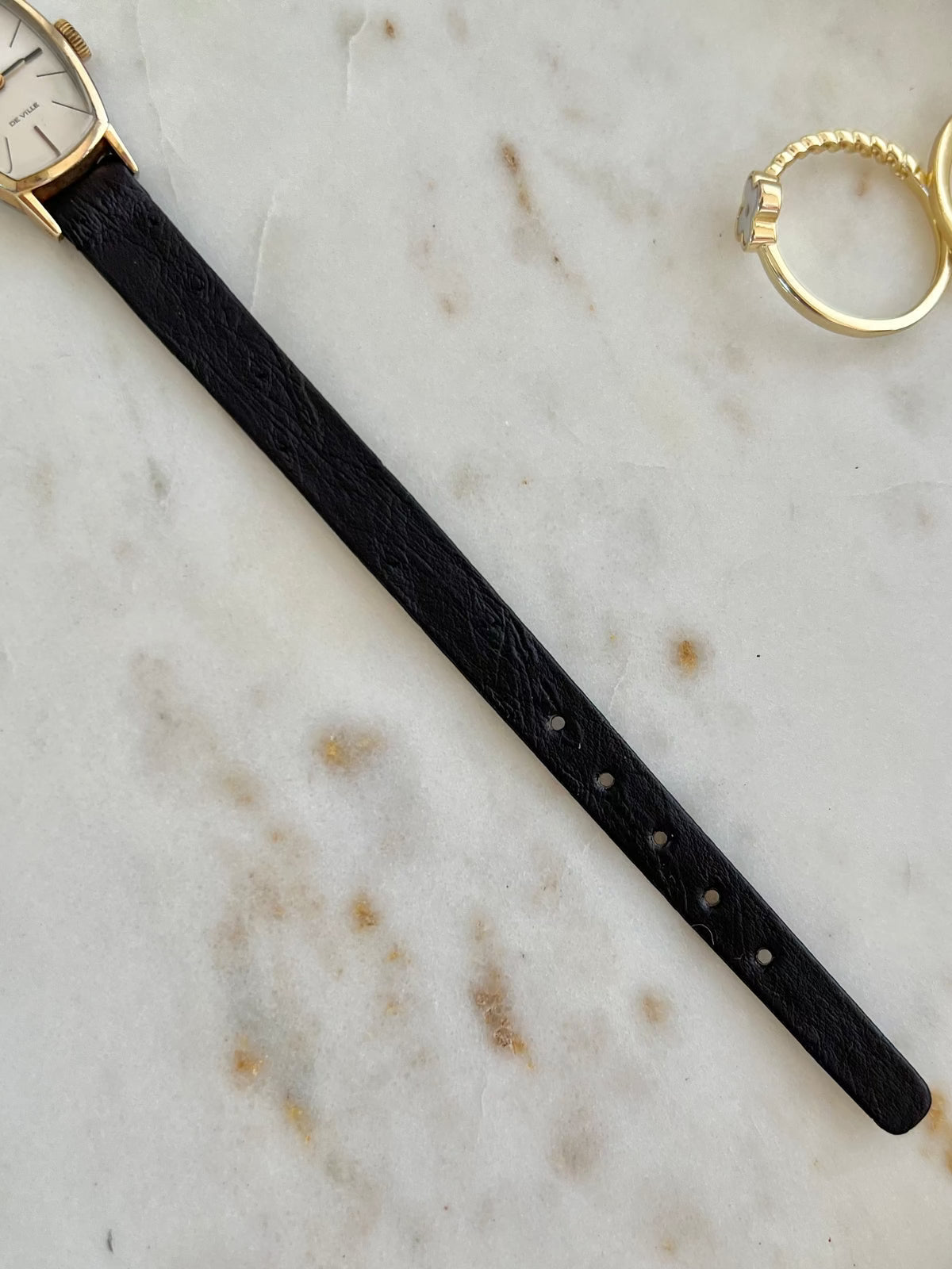 Omega De Ville petite tonneau women’s watch, wrist shot.