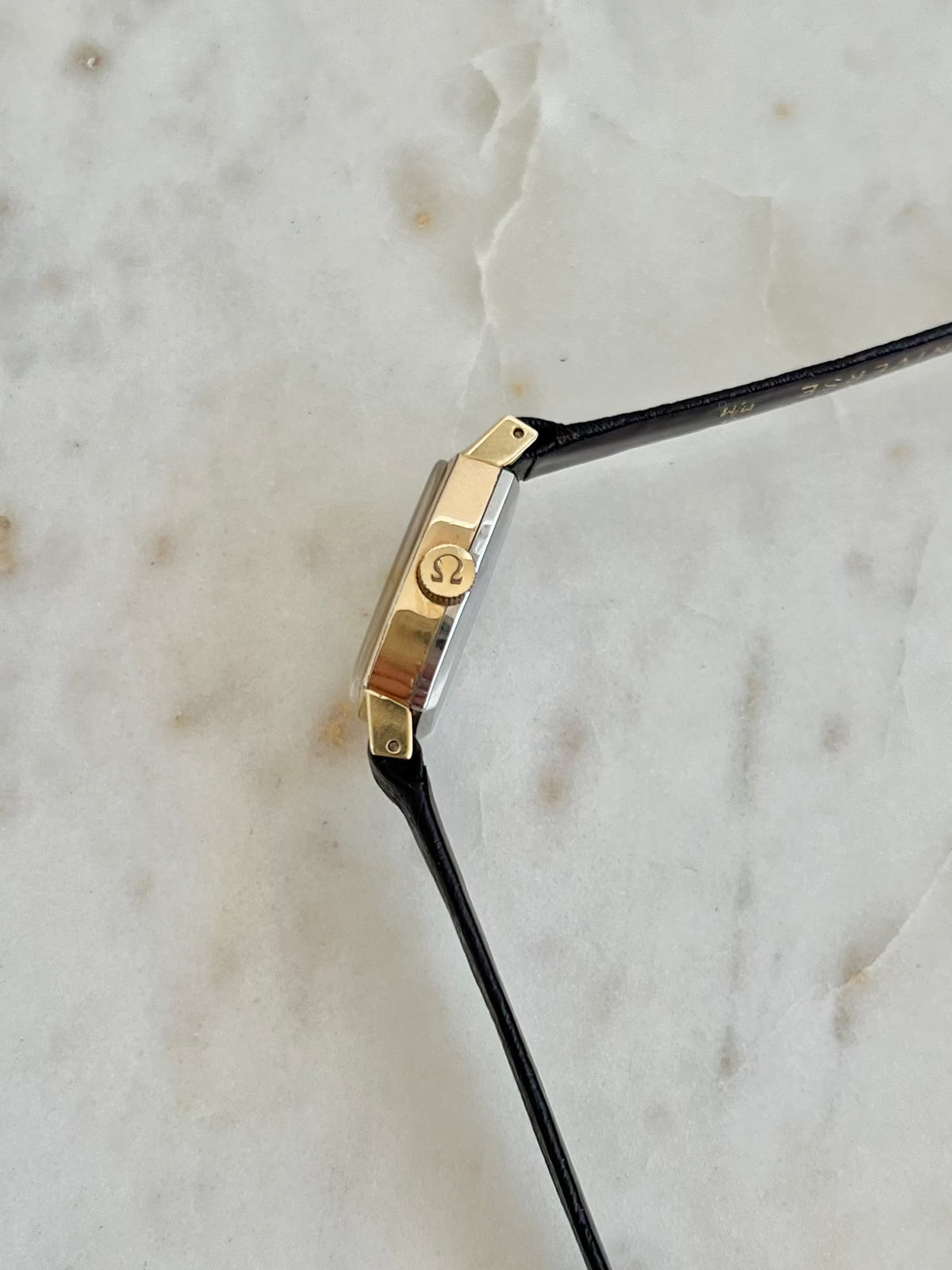 Omega De Ville petite tonneau women’s watch, strap detail.