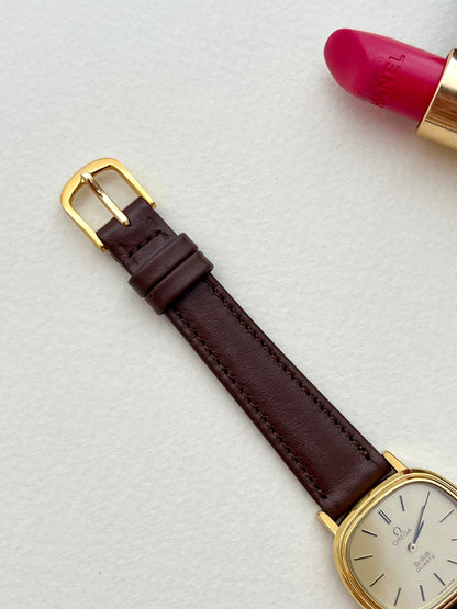 Omega De Ville Cushion Gold Toned Woman's Watch, wrist shot of a vintage women's watch at Gilded Hour.