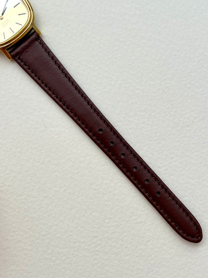 Omega De Ville Cushion Gold Toned Woman's Watch, case profile of a vintage women's watch at Gilded Hour.