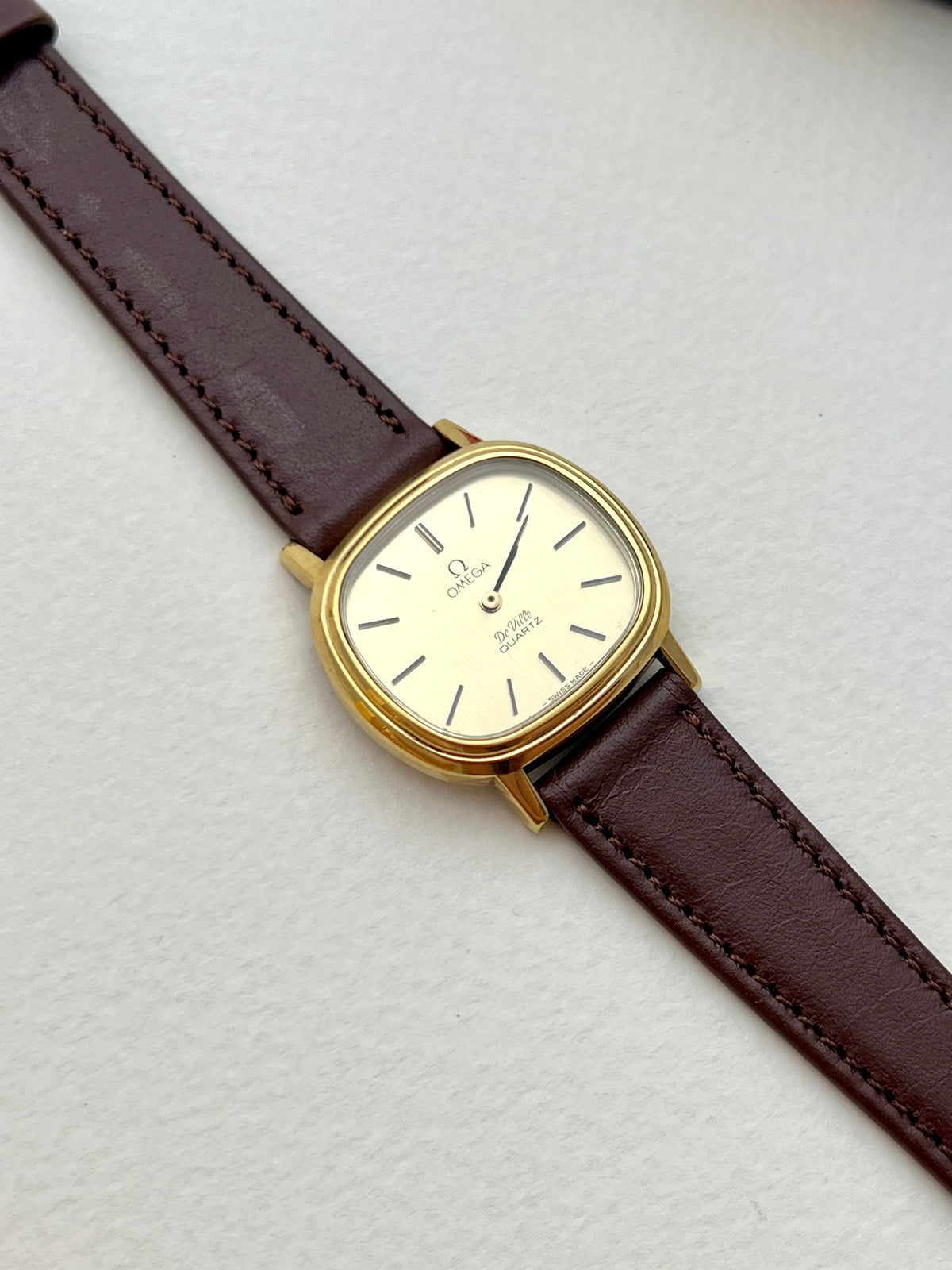 Omega De Ville Cushion Gold Toned Woman's Watch, bracelet detail of a vintage women's watch at Gilded Hour.