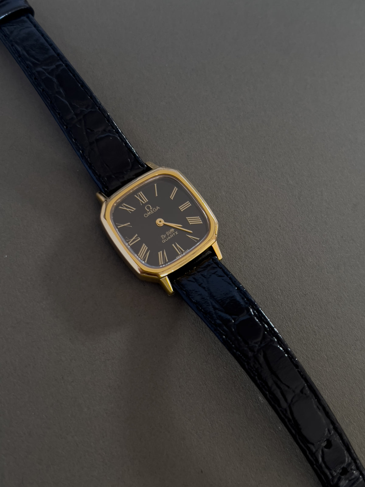 Omega De Ville Rectangular Woman’s Watch with Black Dial, dial close up of a vintage women's watch at Gilded Hour.