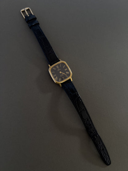 Omega De Ville Rectangular Woman’s Watch with Black Dial, dial close up of a vintage women's watch at Gilded Hour.