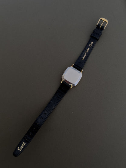 Omega De Ville Rectangular Woman’s Watch with Black Dial, dial close up of a vintage women's watch at Gilded Hour.
