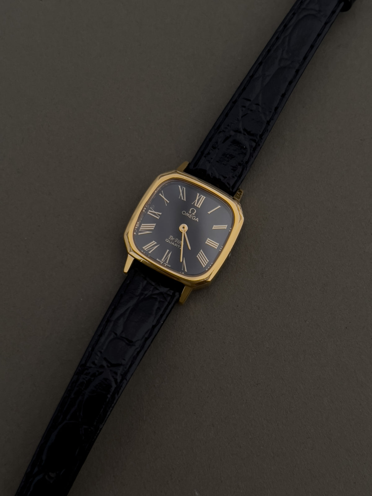 Omega De Ville Rectangular Woman’s Watch with Black Dial, dial close up of a vintage women's watch at Gilded Hour.