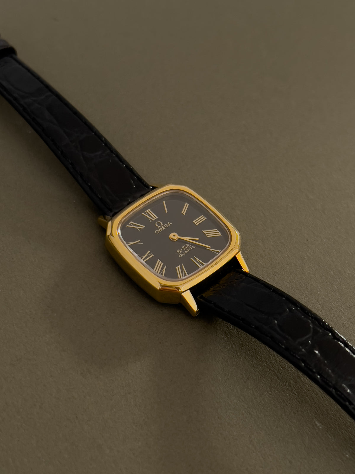 Omega De Ville Rectangular Woman’s Watch with Black Dial, dial close up of a vintage women's watch at Gilded Hour.