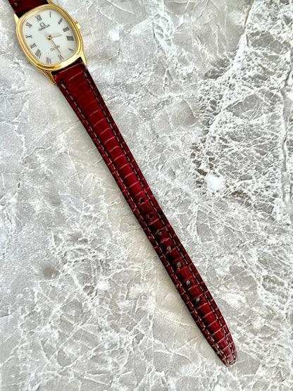 Length of the Omega De Ville red crocodile-pattern watch strap showing adjustment holes