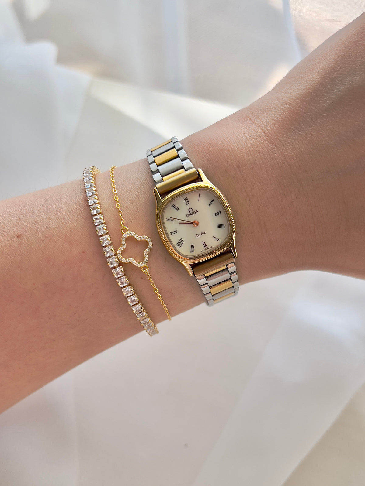Omega De Ville Cushion Case Woman's Watch with Rope Bezel Pattern, dial close up of a vintage women's watch at Gilded Hour.