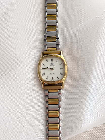 Omega De Ville Cushion Case Woman's Watch with Rope Bezel Pattern, case profile of a vintage women's watch at Gilded Hour.
