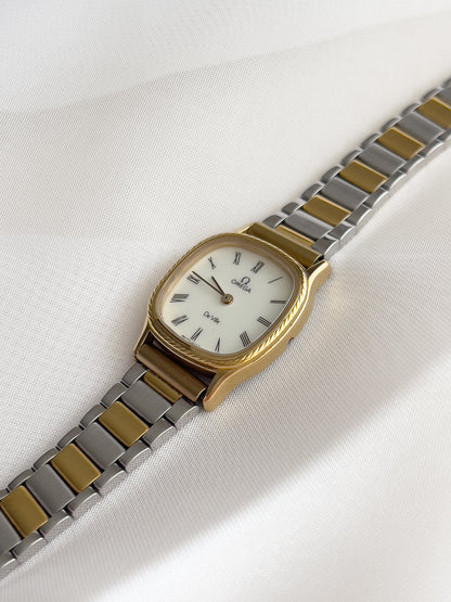 Omega De Ville Cushion Case Woman's Watch with Rope Bezel Pattern, front view of a vintage women's watch at Gilded Hour.