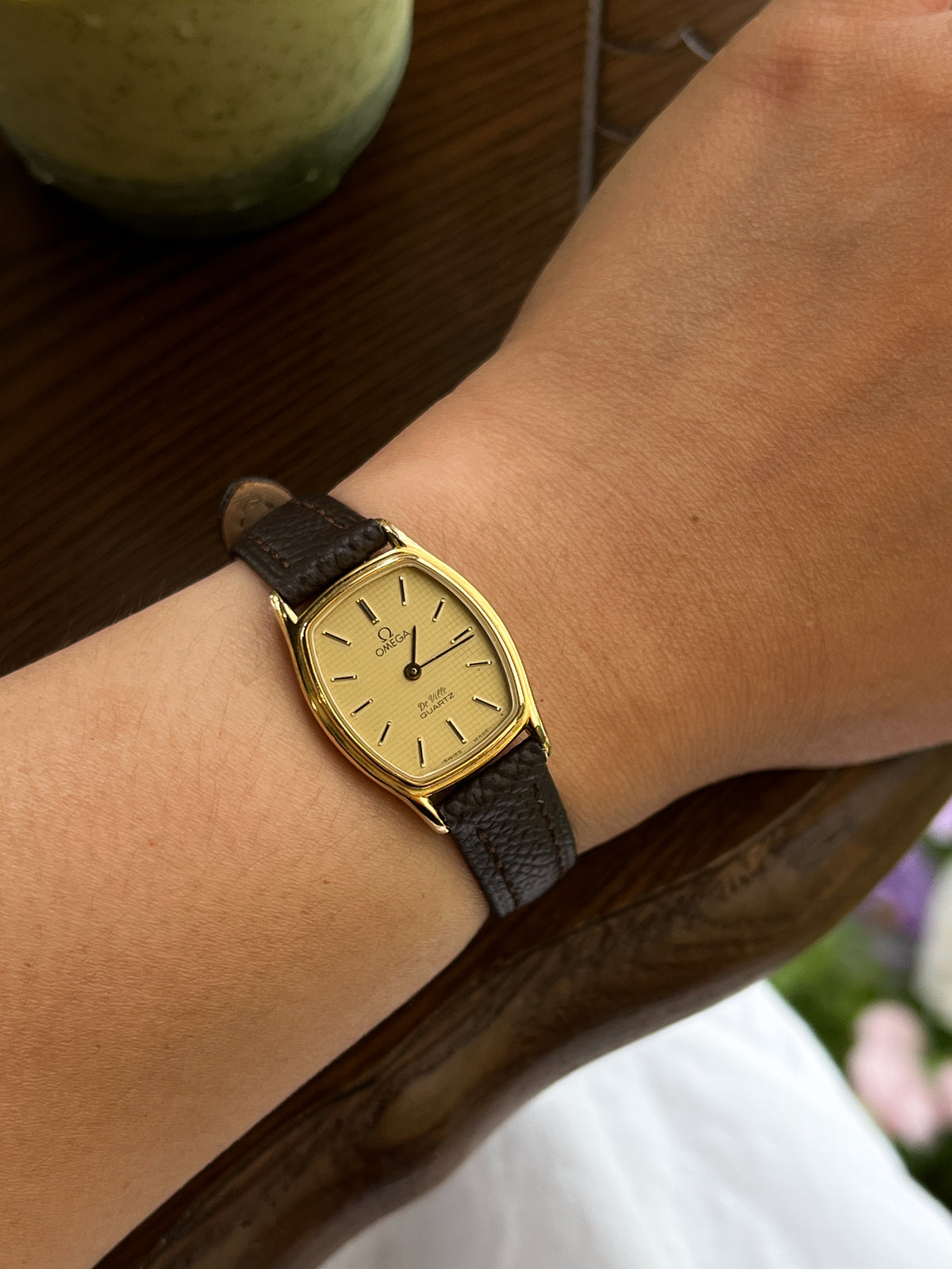 Omega De Ville tonneau grid dial women’s watch, dial close-up.