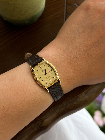 Omega De Ville tonneau grid dial women’s watch, dial close-up.
