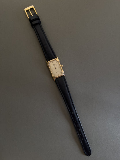 Omega De Ville Ladies Rectangular Gold-Plated Watch with Guilloché Dial, front view of a vintage women's watch at Gilded Hour.