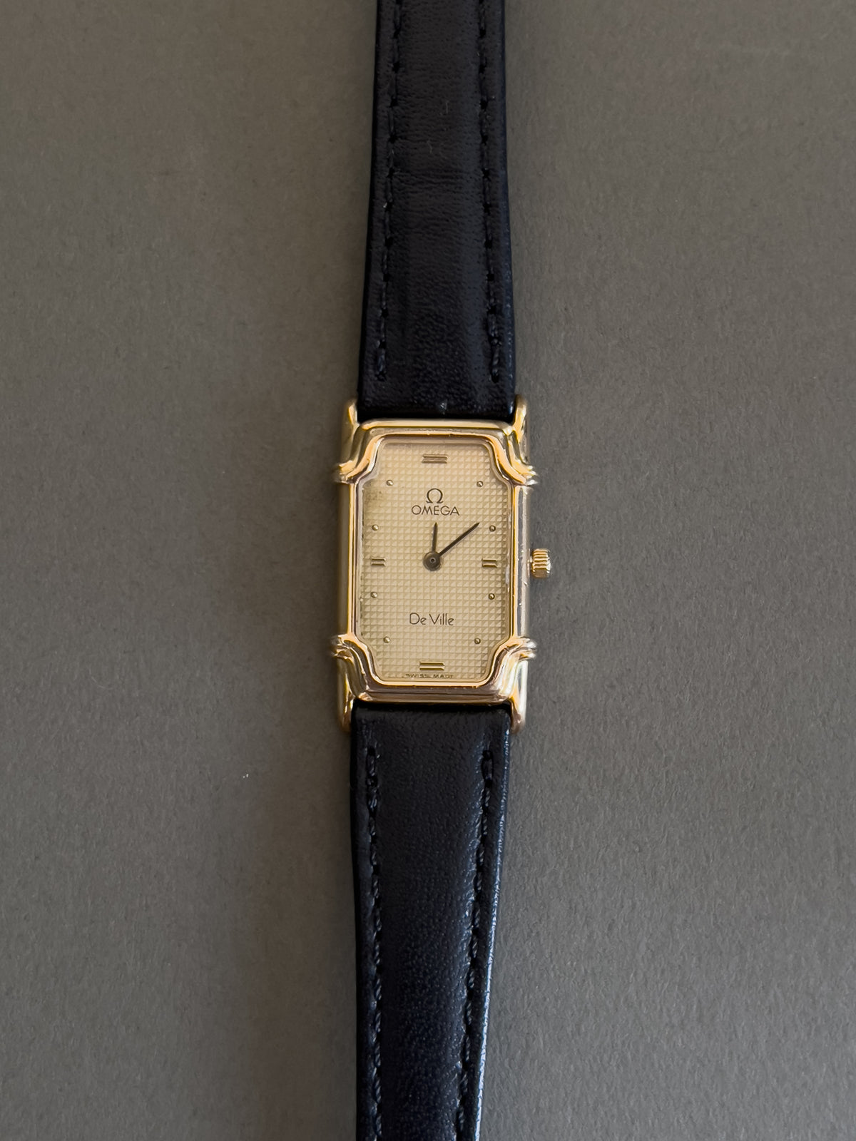 Omega De Ville Ladies Rectangular Gold-Plated Watch with Guilloché Dial, bracelet detail of a vintage women's watch at Gilded Hour.