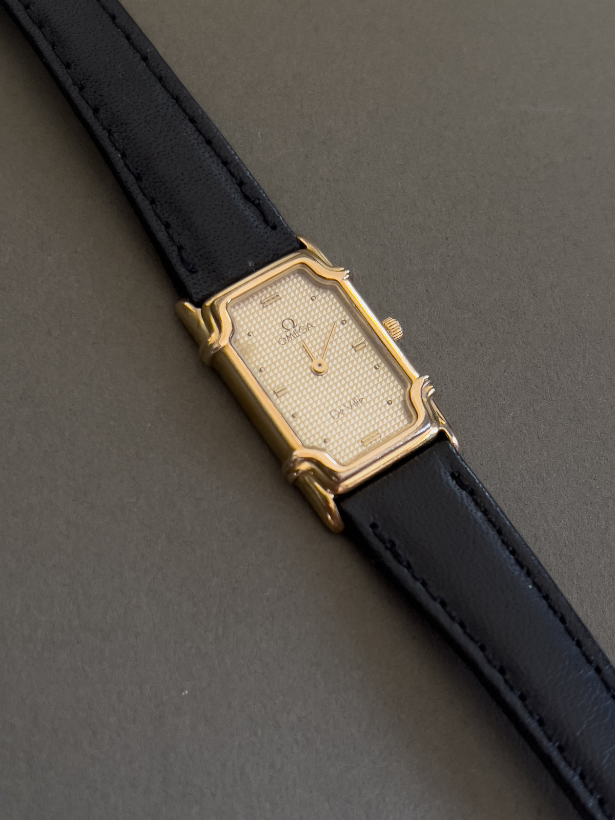 Omega De Ville Ladies Rectangular Gold-Plated Watch with Guilloché Dial, caseback detail of a vintage women's watch at Gilded Hour.