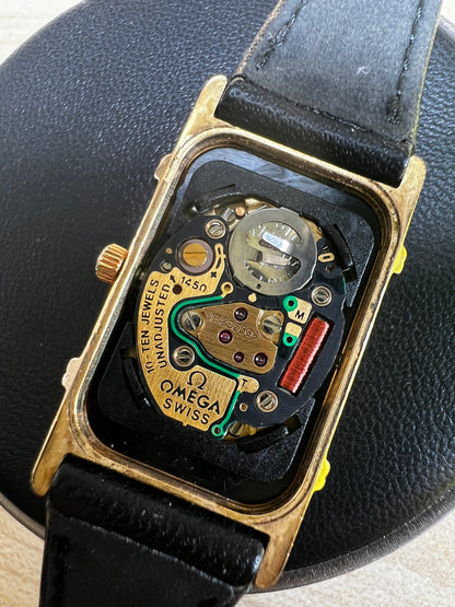 Omega De Ville Ladies Rectangular Gold-Plated Watch with Guilloché Dial, front view of a vintage women's watch at Gilded Hour.