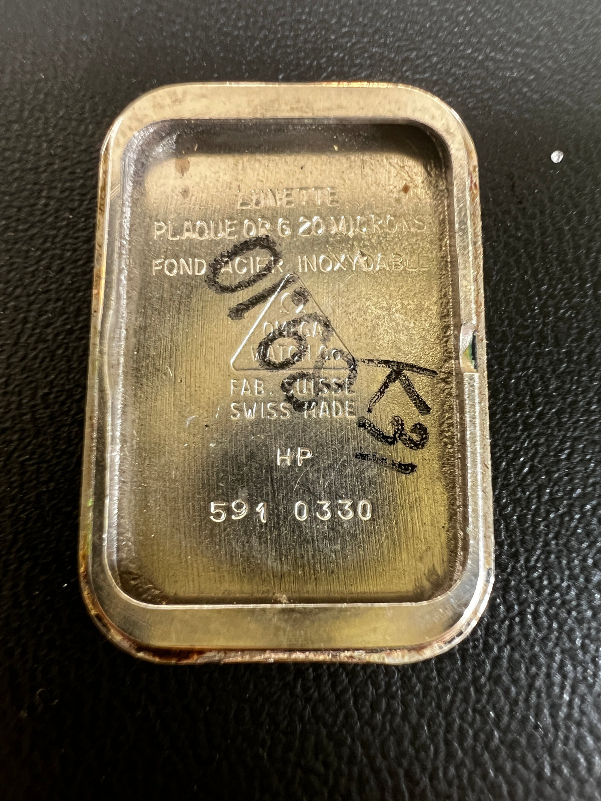 Omega De Ville Ladies Rectangular Gold-Plated Watch with Guilloché Dial, dial close up of a vintage women's watch at Gilded Hour.