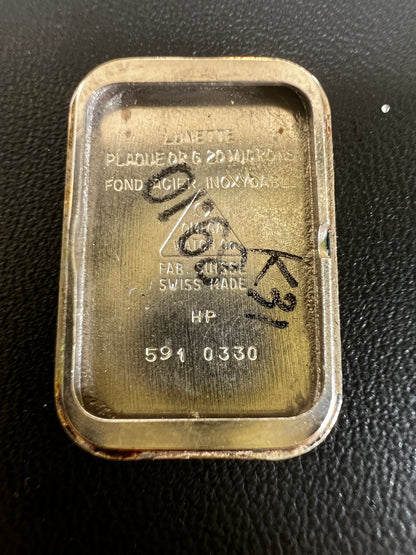 Omega De Ville Ladies Rectangular Gold-Plated Watch with Guilloché Dial, dial close up of a vintage women's watch at Gilded Hour.