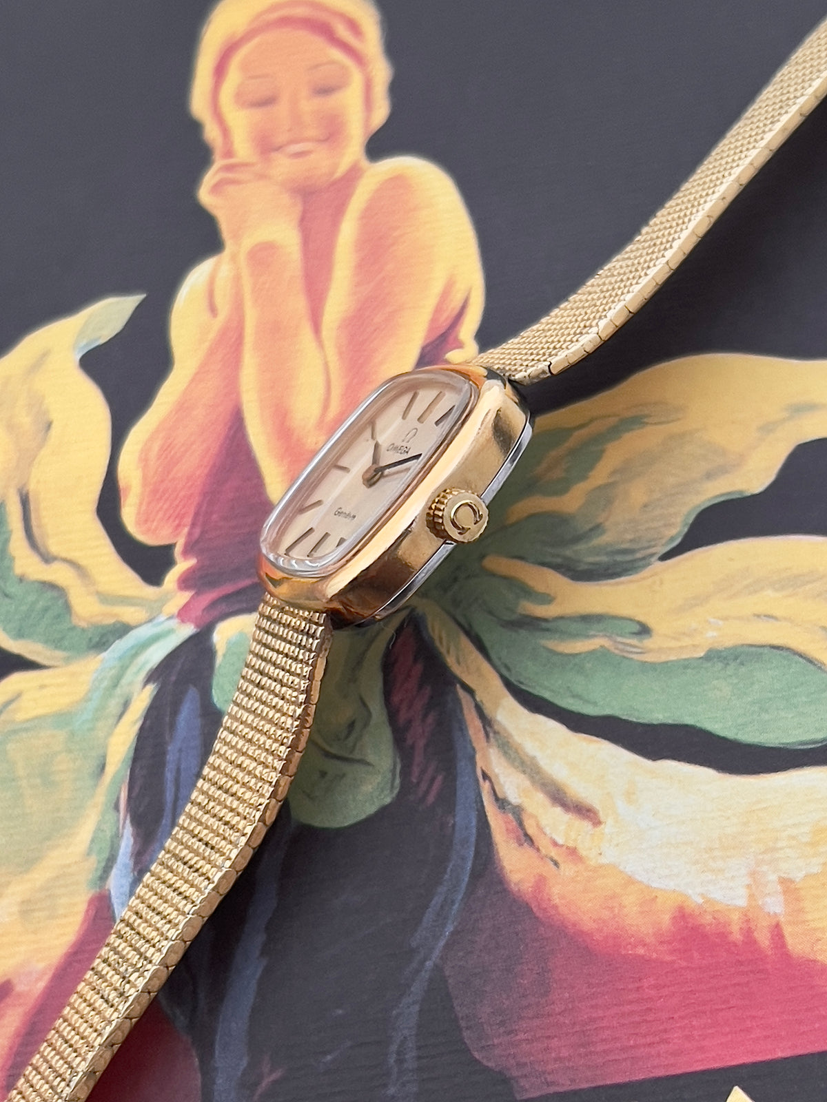 Caseback detail of the Omega Geneve mechanical watch.