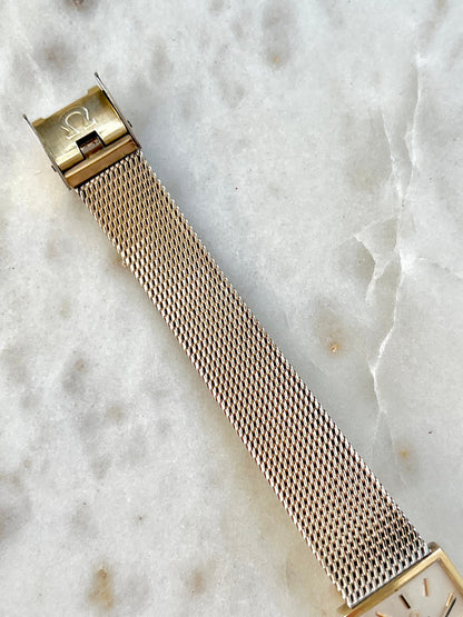 Omega Rectangular 14k Gold Filled Mesh Bracelet Watch, bracelet detail of a vintage women's watch at Gilded Hour.