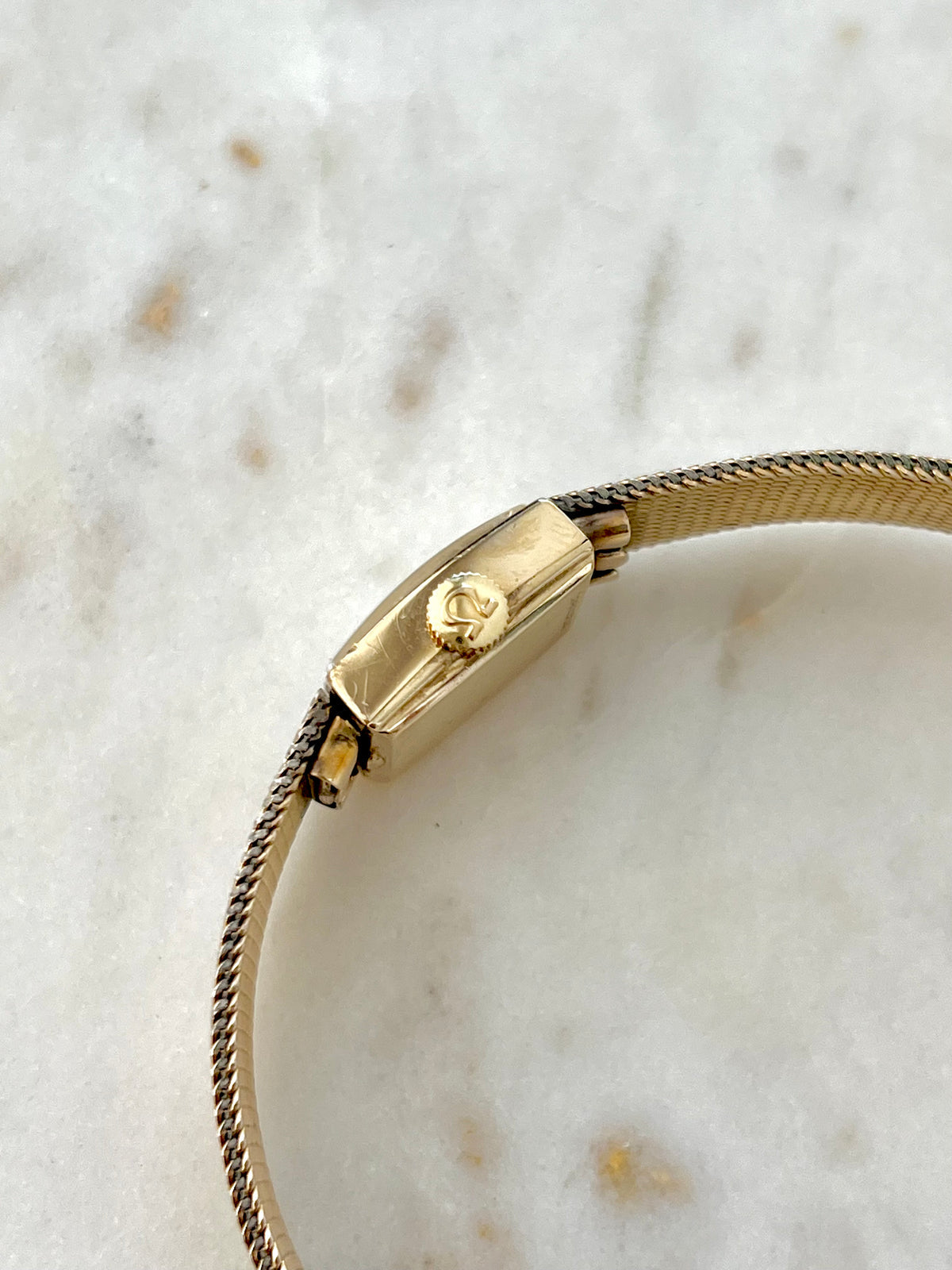 Omega Rectangular 14k Gold Filled Mesh Bracelet Watch, bracelet detail of a vintage women's watch at Gilded Hour.