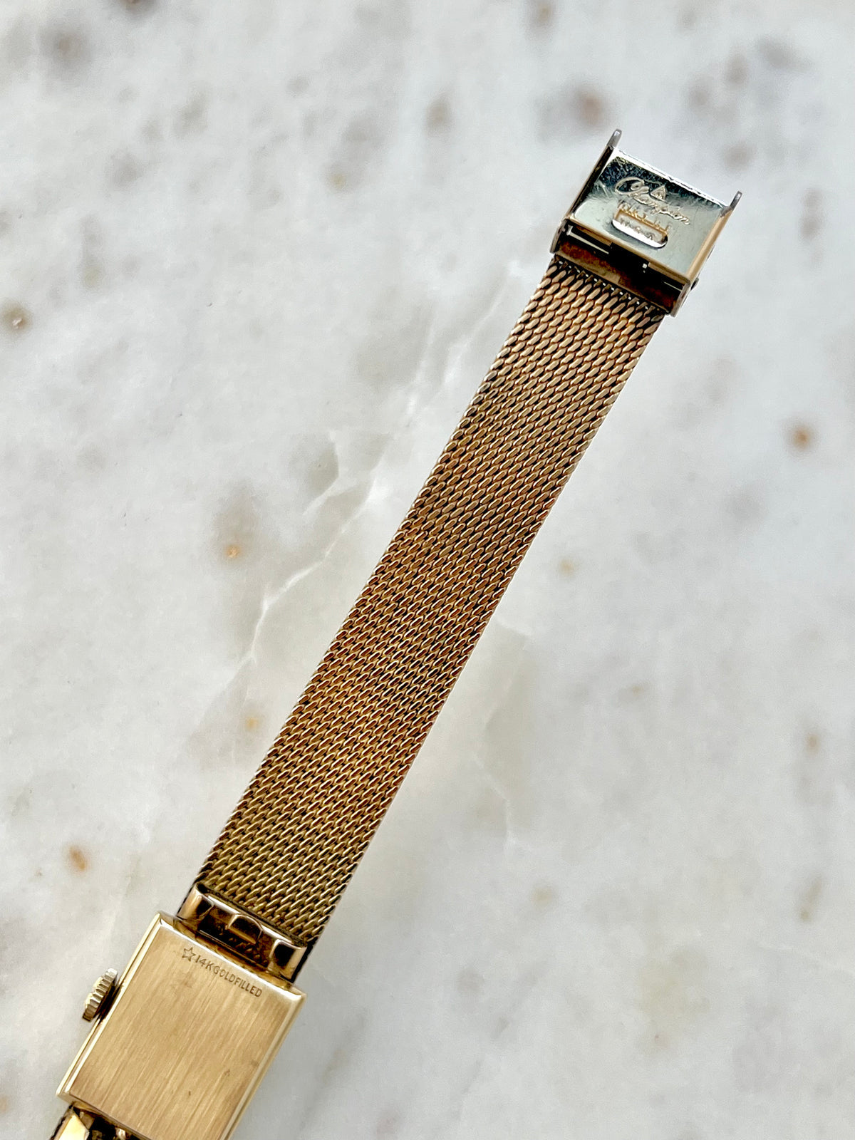 Omega Rectangular 14k Gold Filled Mesh Bracelet Watch, bracelet detail of a vintage women's watch at Gilded Hour.