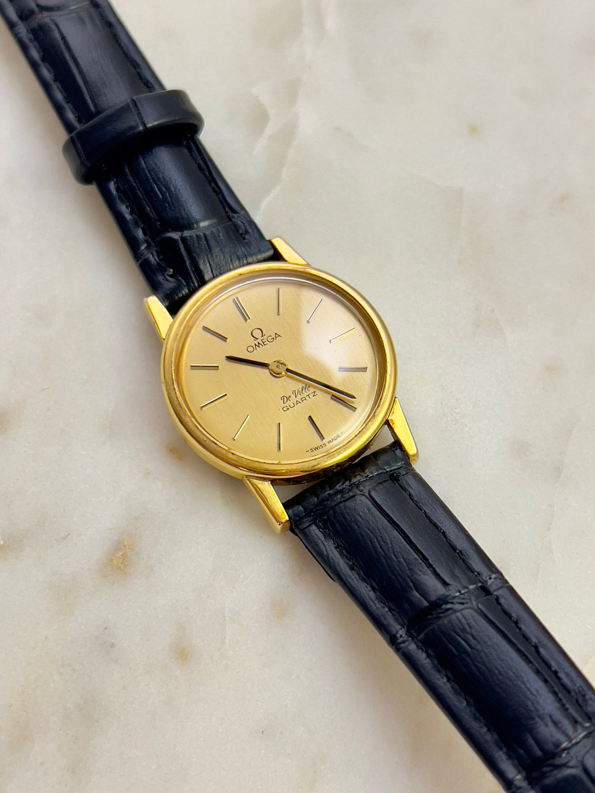 Omega Round Gold Toned Woman's Watch, box set of a vintage women's watch at Gilded Hour.