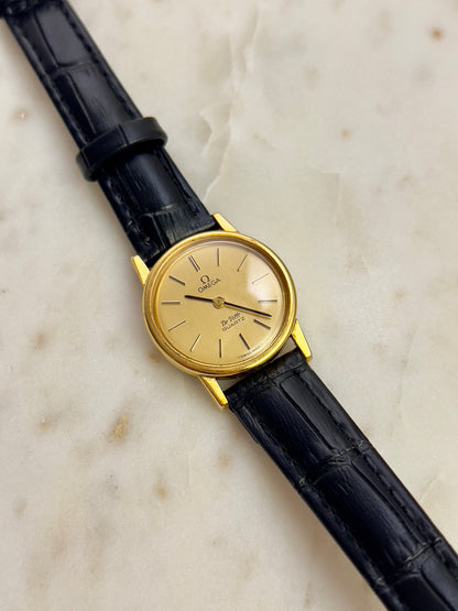 Omega Round Gold Toned Woman's Watch, front view of a vintage women's watch at Gilded Hour.