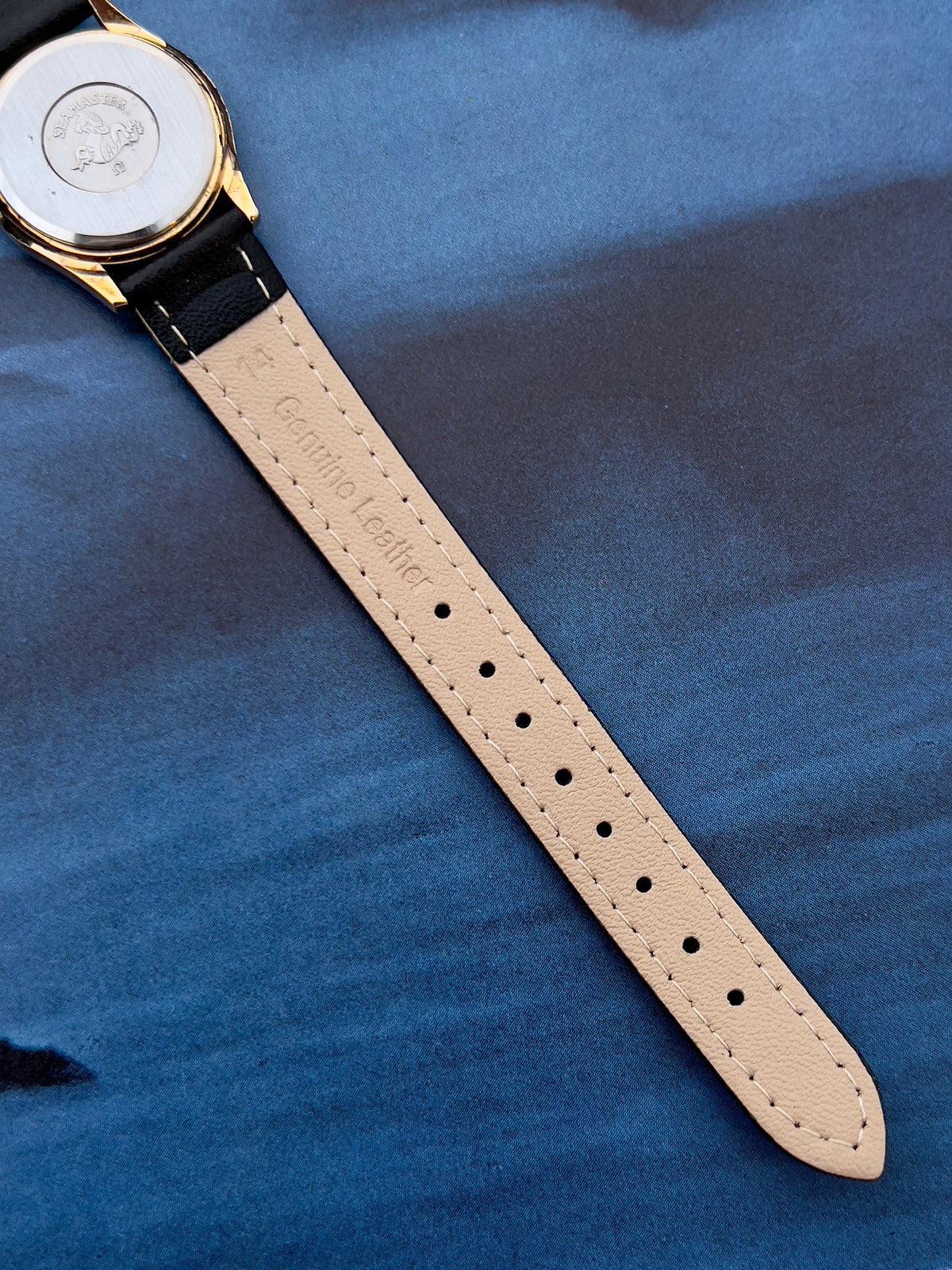 Front view of the Omega Seamaster gold watch.