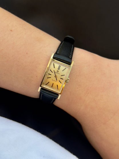 Omega Tank Gold Toned Woman's Watch, wrist shot of a vintage women's watch at Gilded Hour.